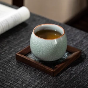 collection of ru kiln ice crackle porcelain tea cups in four styles