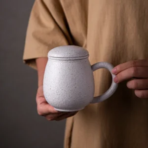 11.5oz speckled off-white ceramic tea mug with infuser full product view