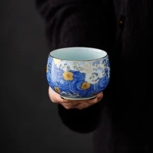 Handcrafted starry sky Chinese Jianzhan style tea bowl full view with blue gold pattern