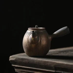 Vintage aged bronze porcelain side handle teapot full view