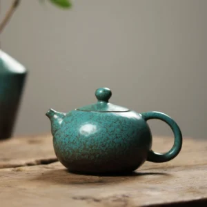 full view of vintage green crackle glaze porcelain Xishi teapot for gongfu tea