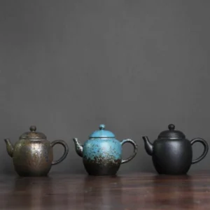 Full view of vintage handcrafted Chinese porcelain teapot with rounded body