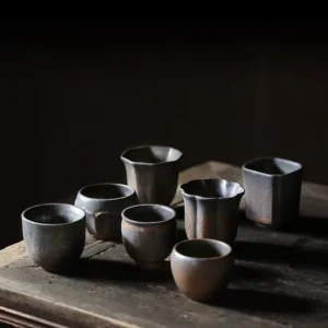 full set display of vintage handcrafted textured porcelain chinese tea cups